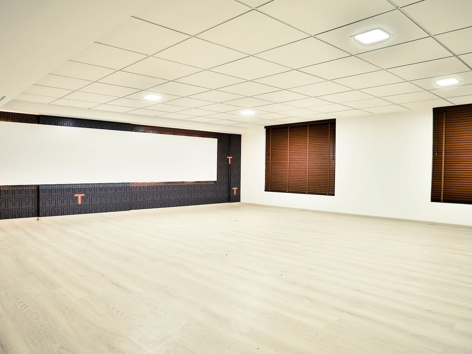 A well-lit empty event space at T24 Residency, Andheri East, Mumbai