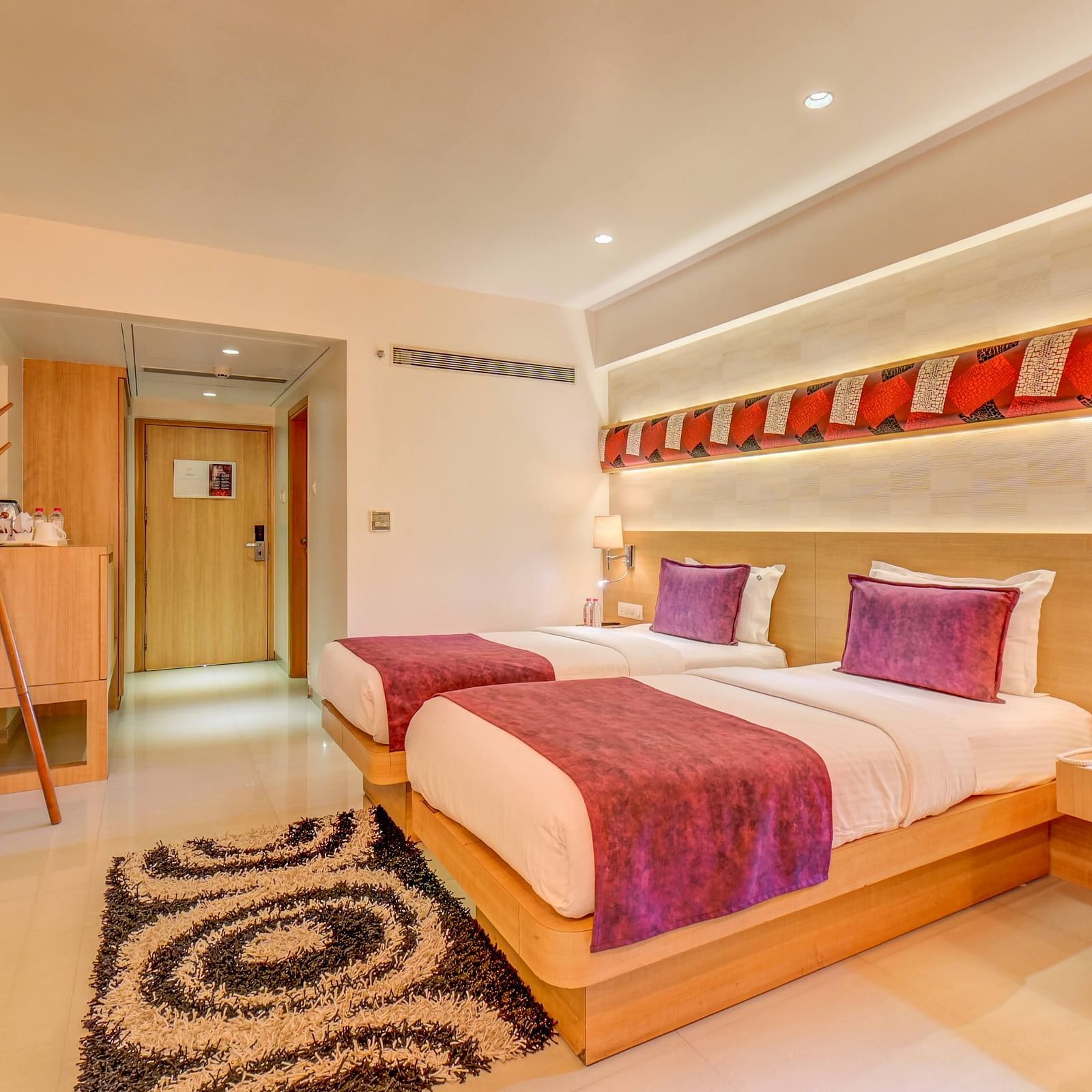 a view of the twin bed at Premium room at The SSK Solitaire Hotel & Banquets, Mumbai Naka - Nashik