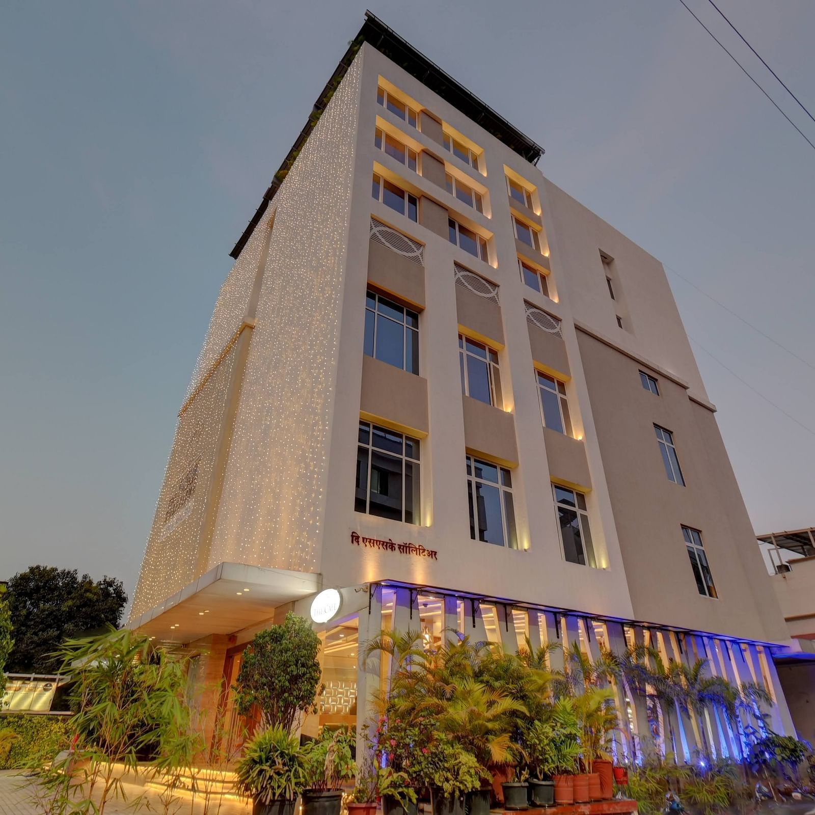 facade image of The SSK Solitaire Hotel & Banquets, Mumbai Naka - Nashik on a clear day