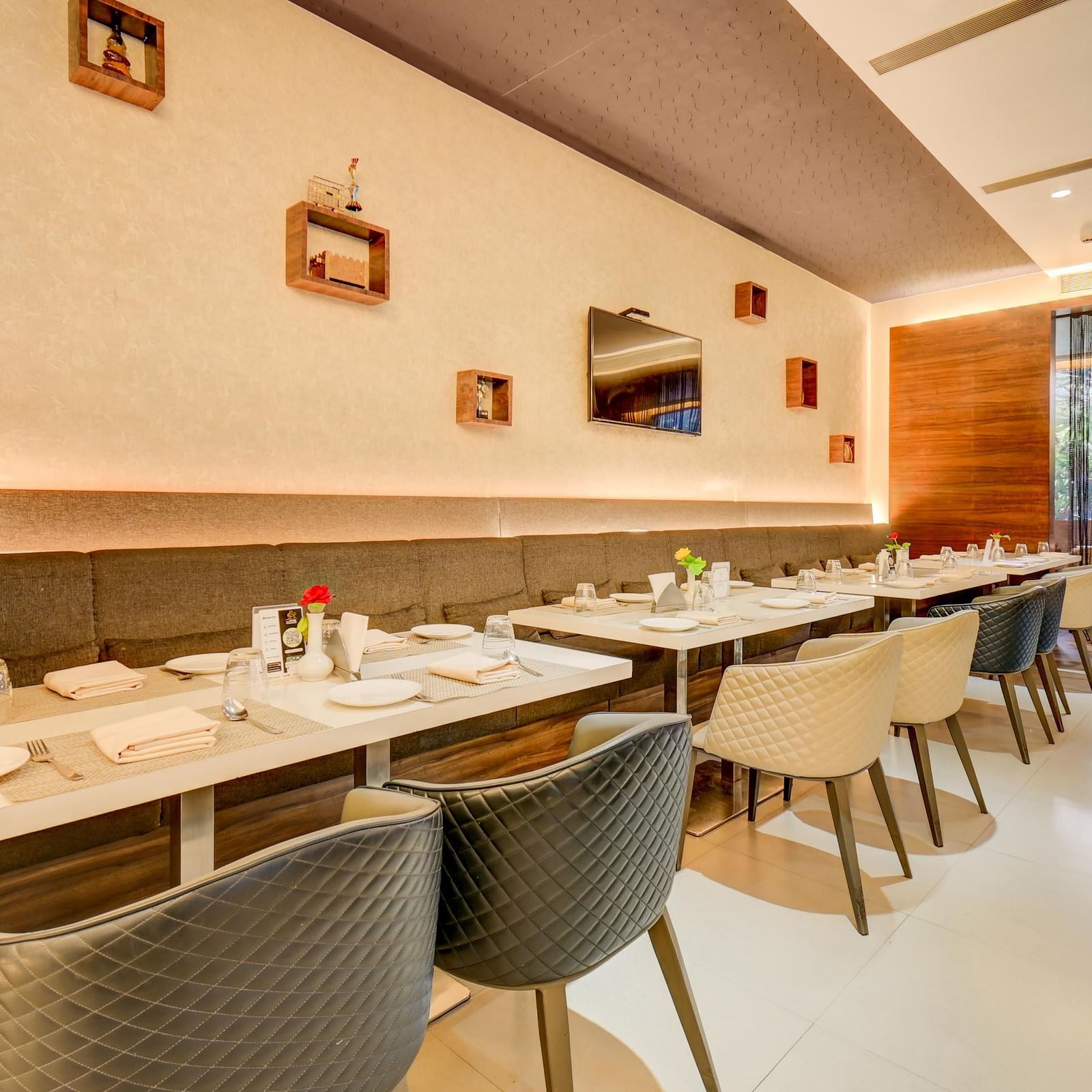 Elegant indoor restaurant dining area of House of Flavour at The SSK Solitaire Hotel & Banquets, Mumbai Naka - Nashik