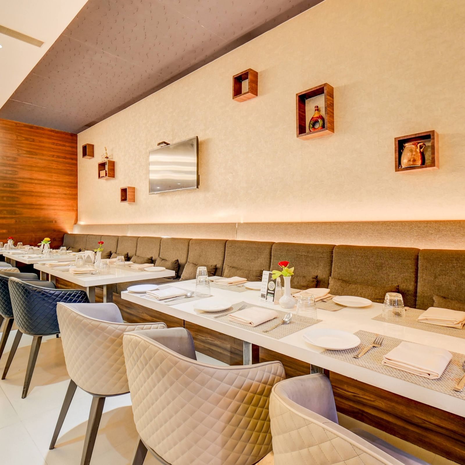 Elegant indoor restaurant dining area of House of Flavour at The SSK Solitaire Hotel & Banquets 