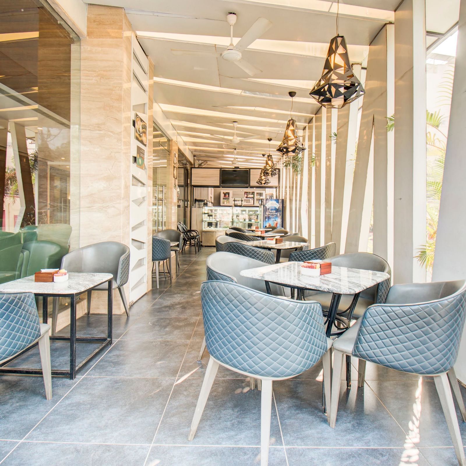 Charming outdoor cafe seating area at the Le Cafetino 