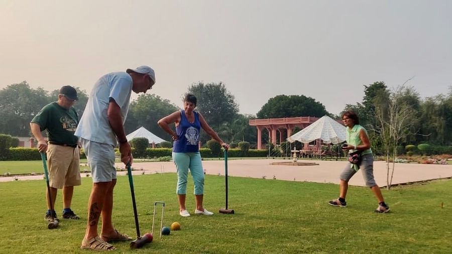 A Game of Croquet at the Palace lawns 1