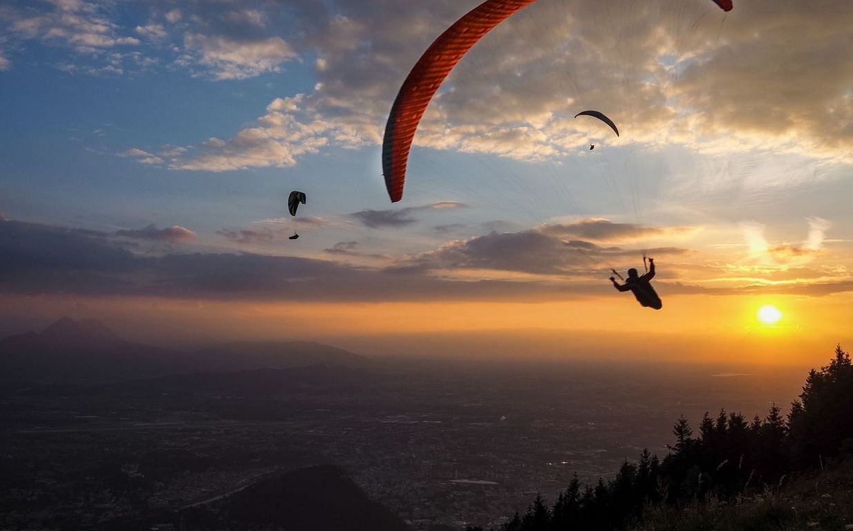 paragliding during sunset