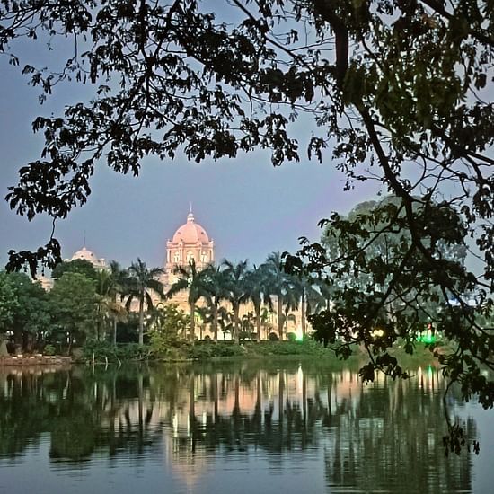 a monument behind a lake