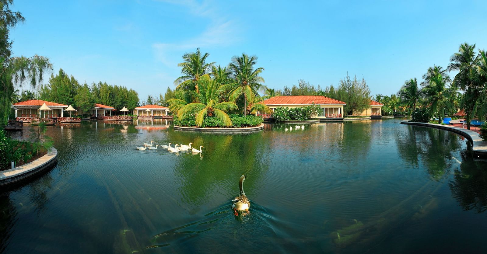 View of Guadeloupe Exterior with a lake in the foreground at Ocean Spray, Pondicherry