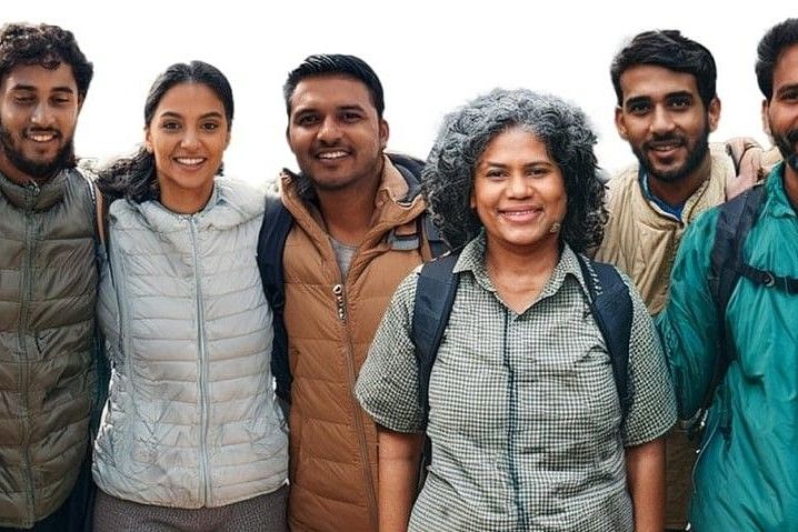 Corporate employees posing for a picture at Nature Trails