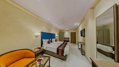 Premium twin bed accommodation at Lords Eco Inn Dahej featuring matching beds, stylish furnishing, and comprehensive guest amenities