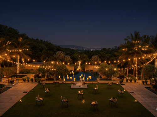 Outdoor lawn at The Serai set up with festive string lights for a New Year's Eve gala.