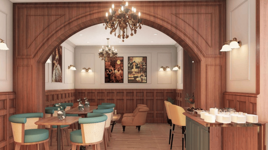 Elegant restaurant or hotel dining area featuring dark wood panelling, an arched doorway, and teal and mustard seating at BluSalzz Terrah Hills Resort, Dalhousie.