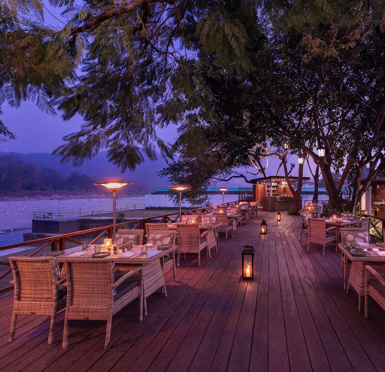 An image of an outdoor dining area beside a lake - The Riverview Retreat,  Corbett