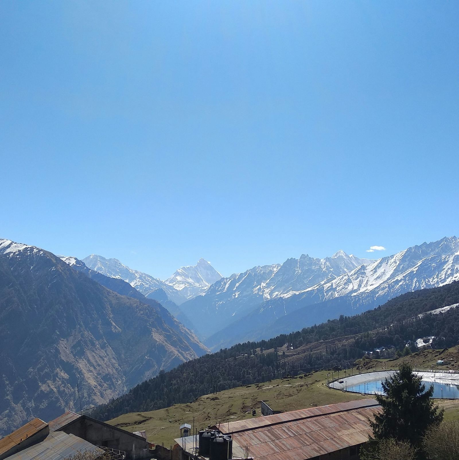 image showcasing splendid views of the himalayas with a clear blue sky in the background