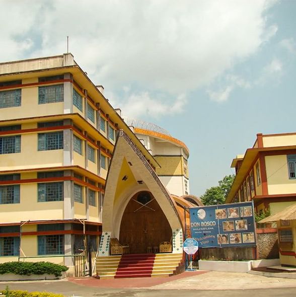 The impressive facade of the Don Bosco Centre for Indigenous Cultures, a major landmark near Polo Hotel Shillong.