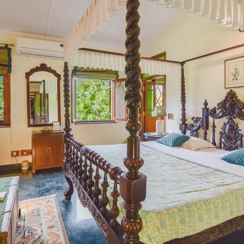 Image of interior of a Hotel Room with bed at Shaheen Bagh Resort Dehradun