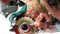 Child painting on a mask