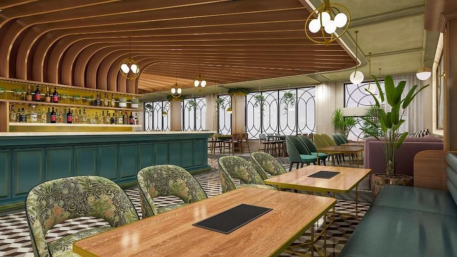 An image of a dining area at Themis Barbecure House, Panipat featuring woden furnished chairs, sofa, and table 