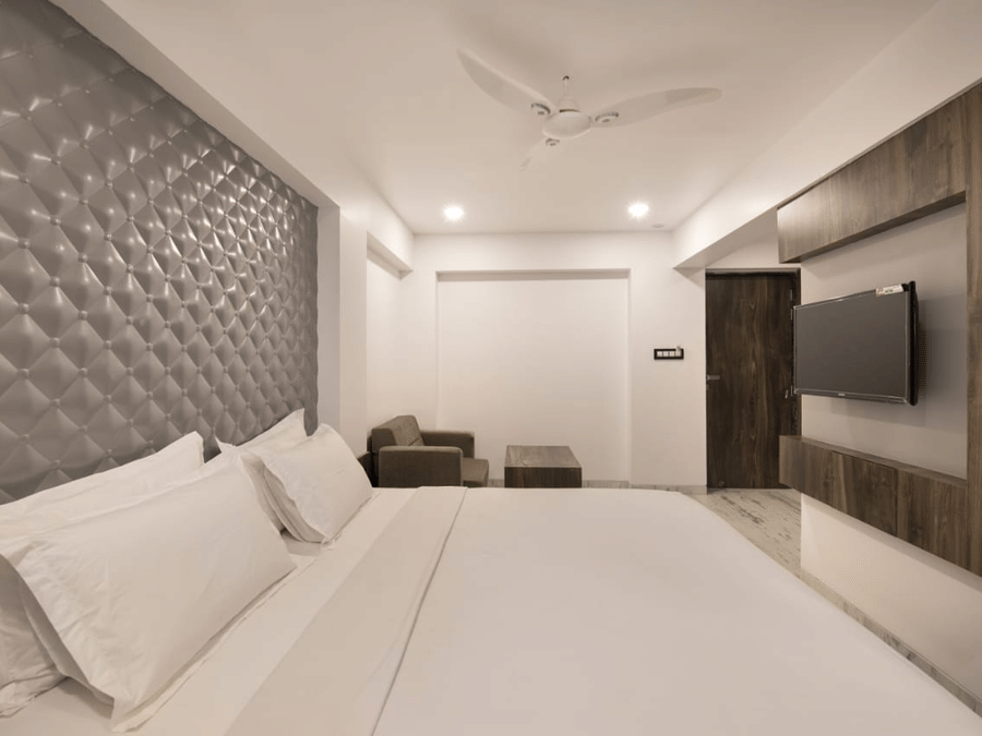 deluxe room side view with well furnished ambience and interior.