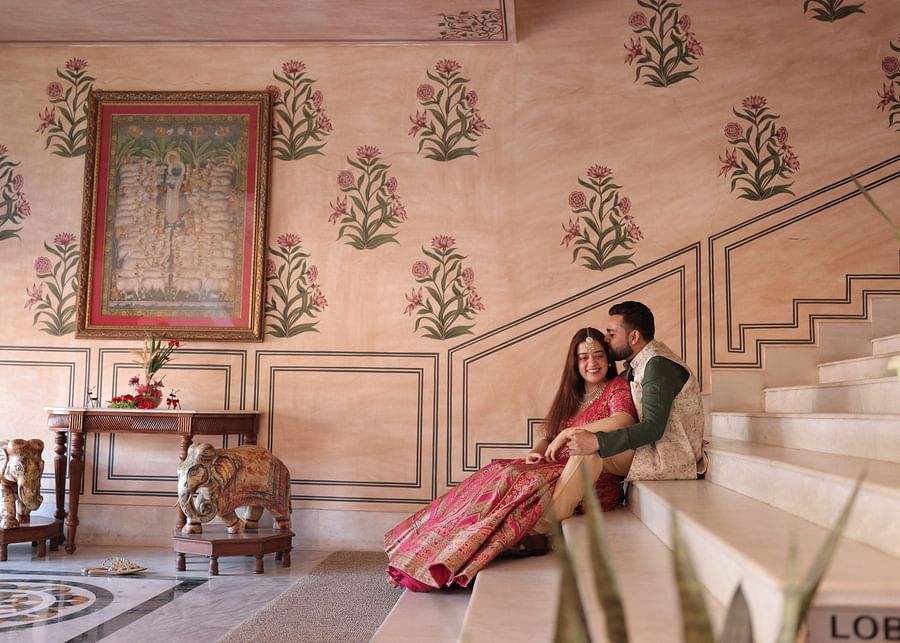 Pre-wedding portrait of Advait & Akshay on a heritage staircase at Umaid Palace.