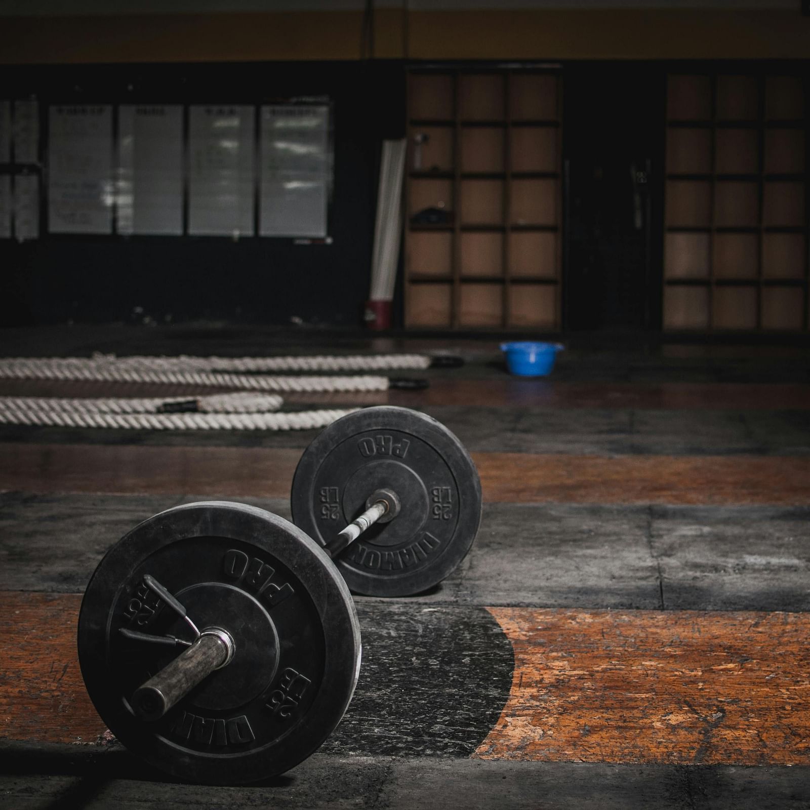 a barbell on the floor in a gym