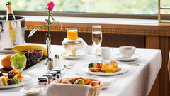 a table full of breakfast items and juices - polo floatel kolkata