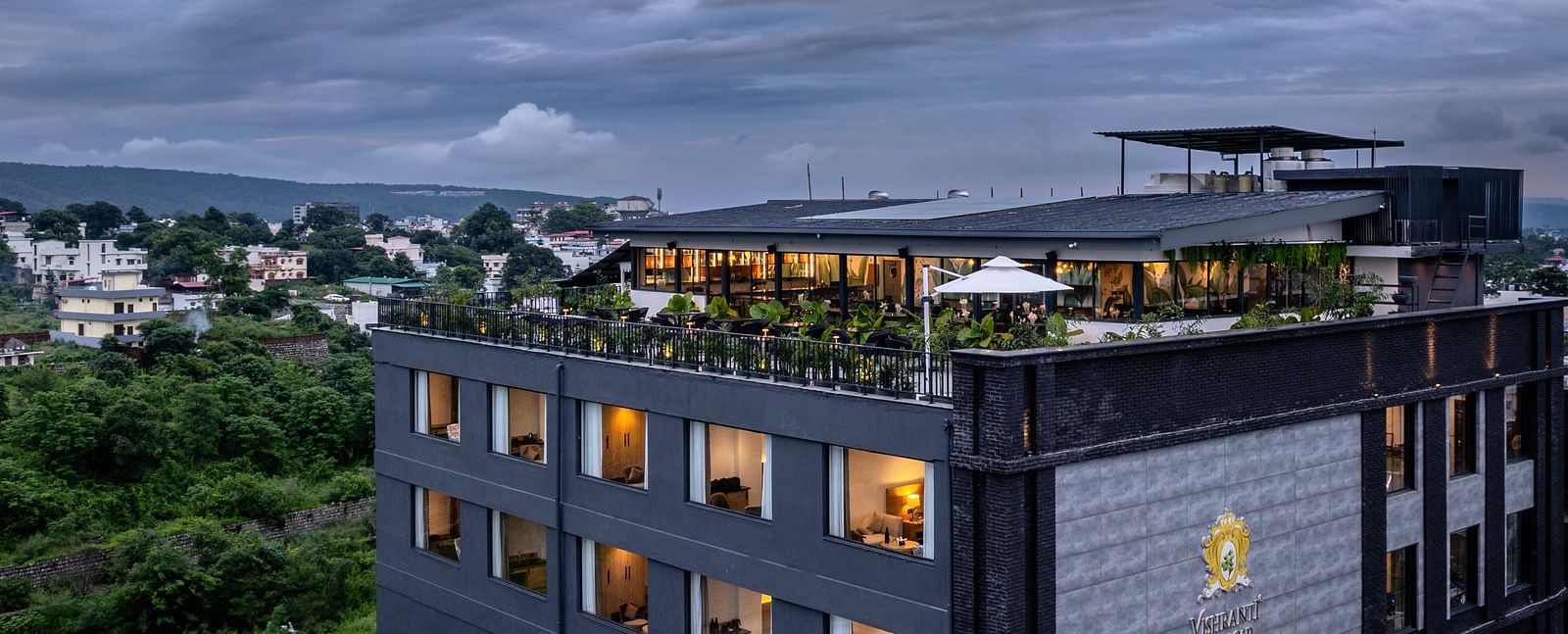 Overview shot of Vishranti Hotel, Dehradun  with a backdrop of cloudy sky