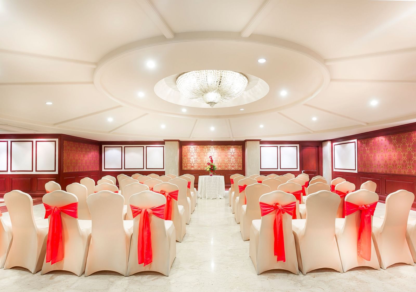Lotus GC banquet hall seating with chairs at Grand Chennai By GRT Hotels.