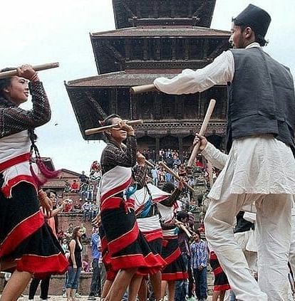 Men and women celebrating the Gai jatra festival