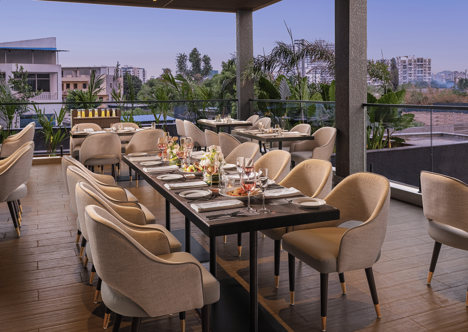 A view of dining area at Citron Bar with comfortable seating at Essentia Premiere, Pune.