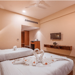 bedroom with a heart made from towels