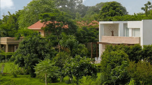 A poster for karma konnect with a villa in view - Karma Lakelands.