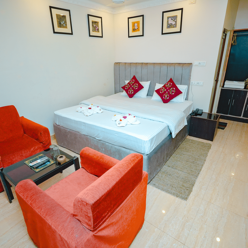 An image of a Cottage Room featuring double size bed, a seating area, and a wardrobe - Rangamati Garden Resort