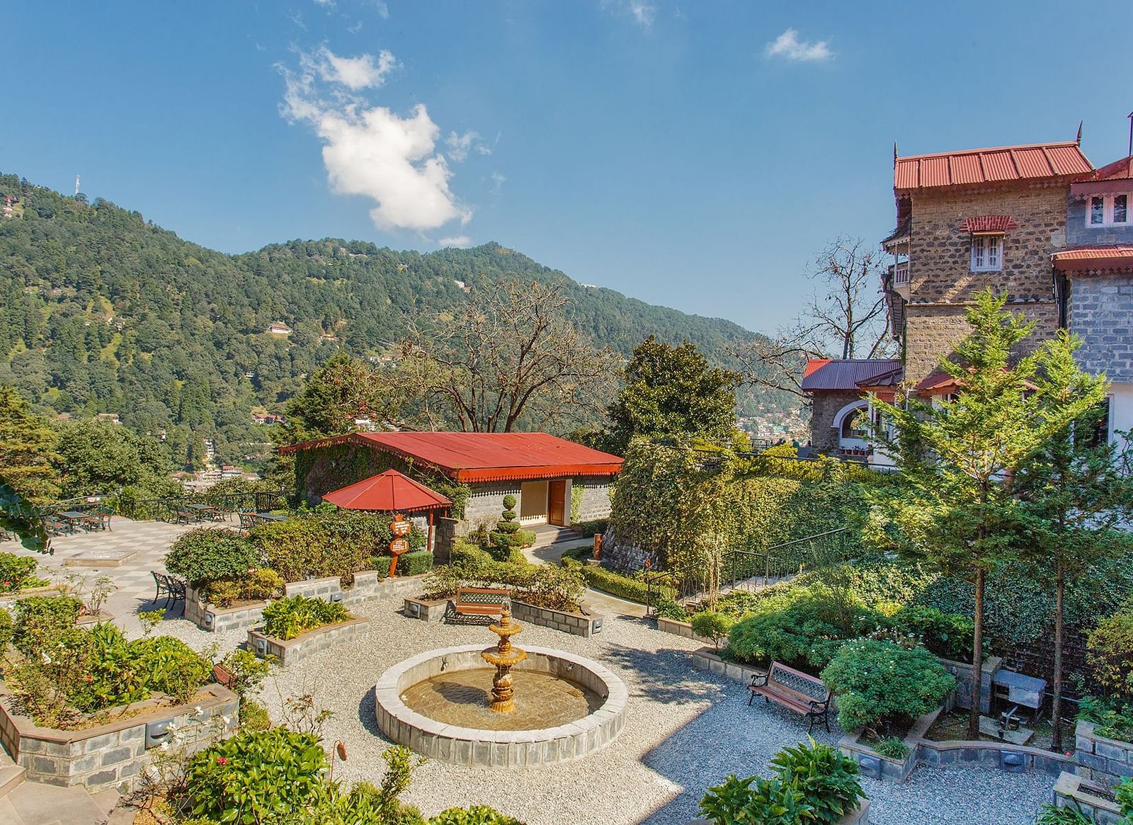 A picture of property with beautiful view of mountains in the background captured in the day time