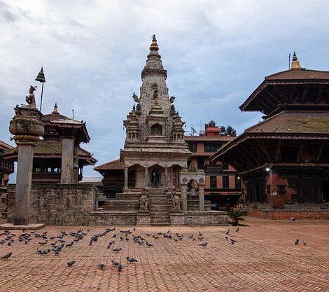 The bhaktapur durbar square with a clear sky in the background