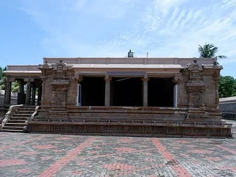 Ancient Someshwara temple stone structure with stairs, showcasing the craftsmanship and history of Dharasuram