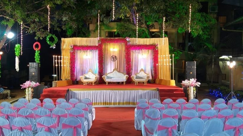 the outside seating area facing the stage at the event space - Zara's Resort