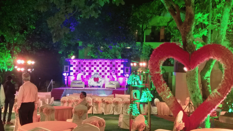an outdoor podium and seats for a wedding ceremony - Zara's Resort