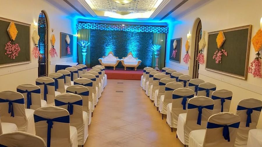indoor seating space at an event hall for a wedding function - Zara's Resort