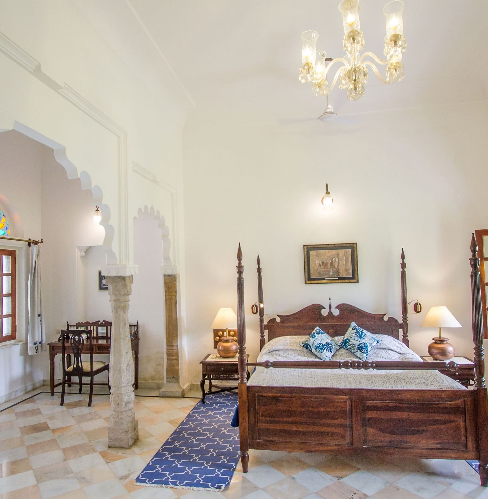 Deluxe suite with a double bed and seating arrangement - Dev Shree, Deogarh