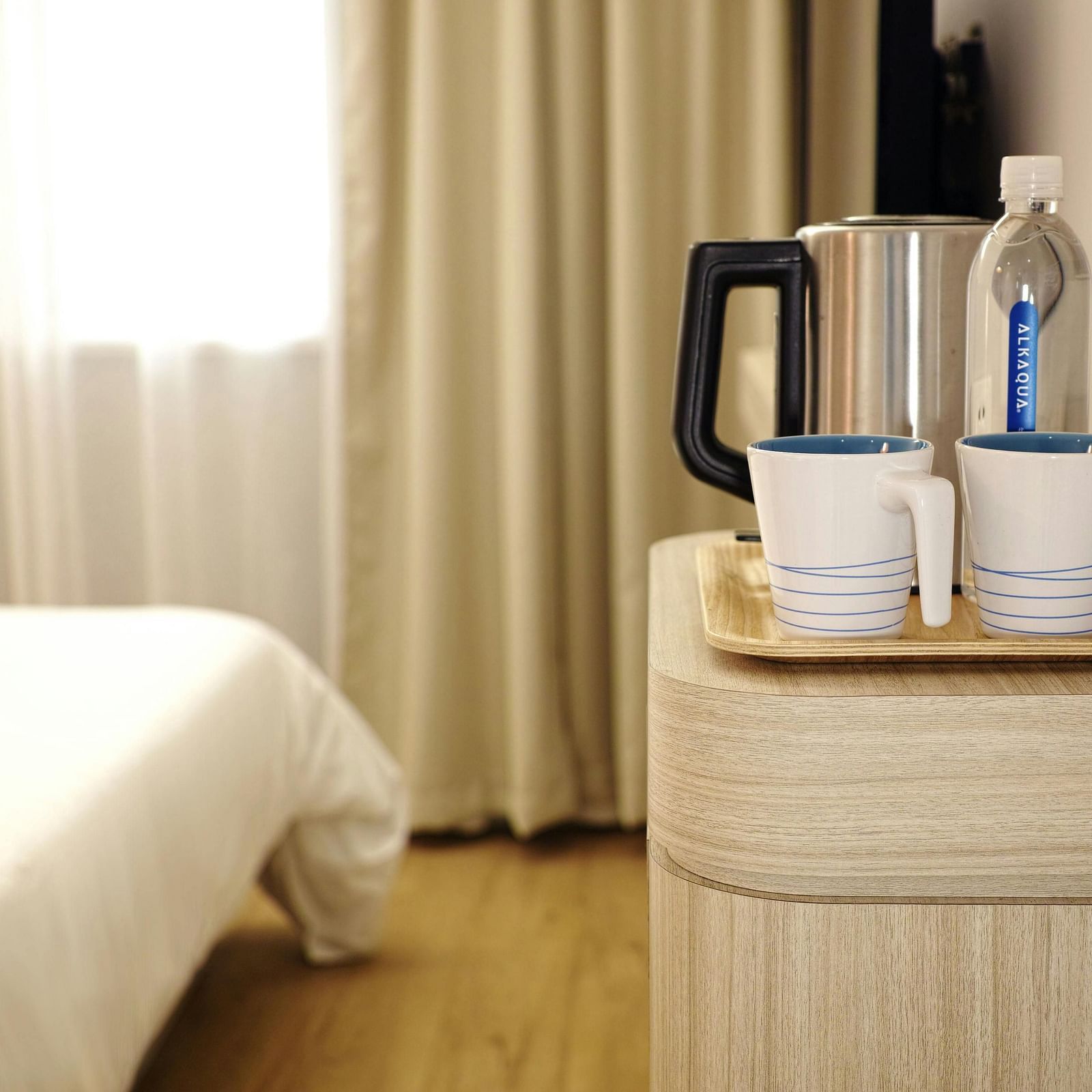 Two White Ceramic Mug on Brown Wooden Tray