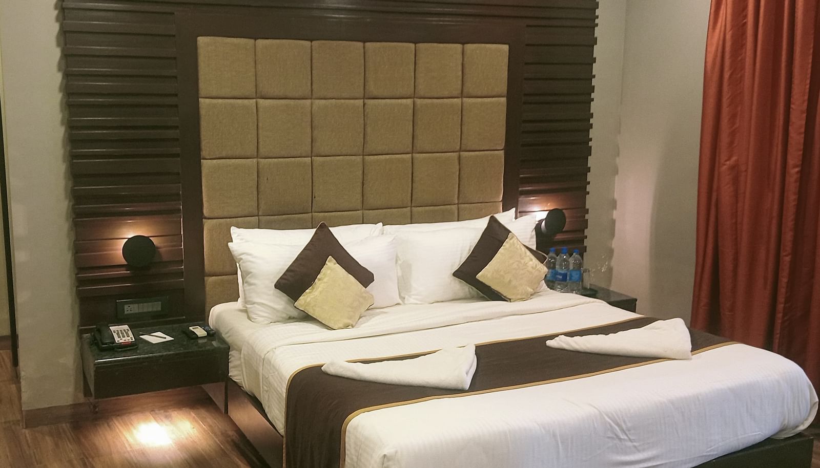 image of the artist suite featuring a plush king size bed at the grand palace, yercaud