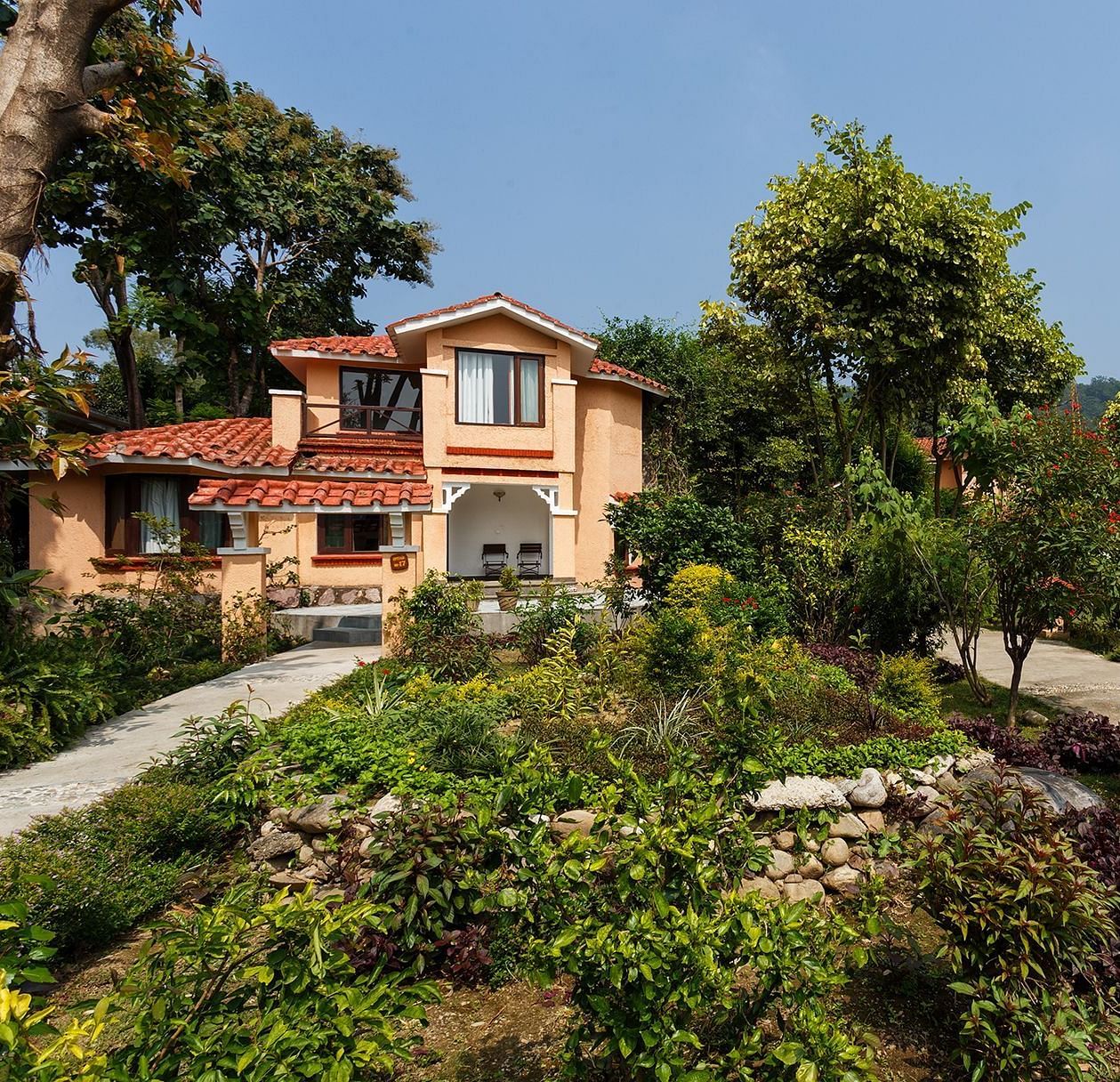 An image of a villa with many rooms and cottages amidst the trees - The Riverview Retreat,  Corbett qu2h5v