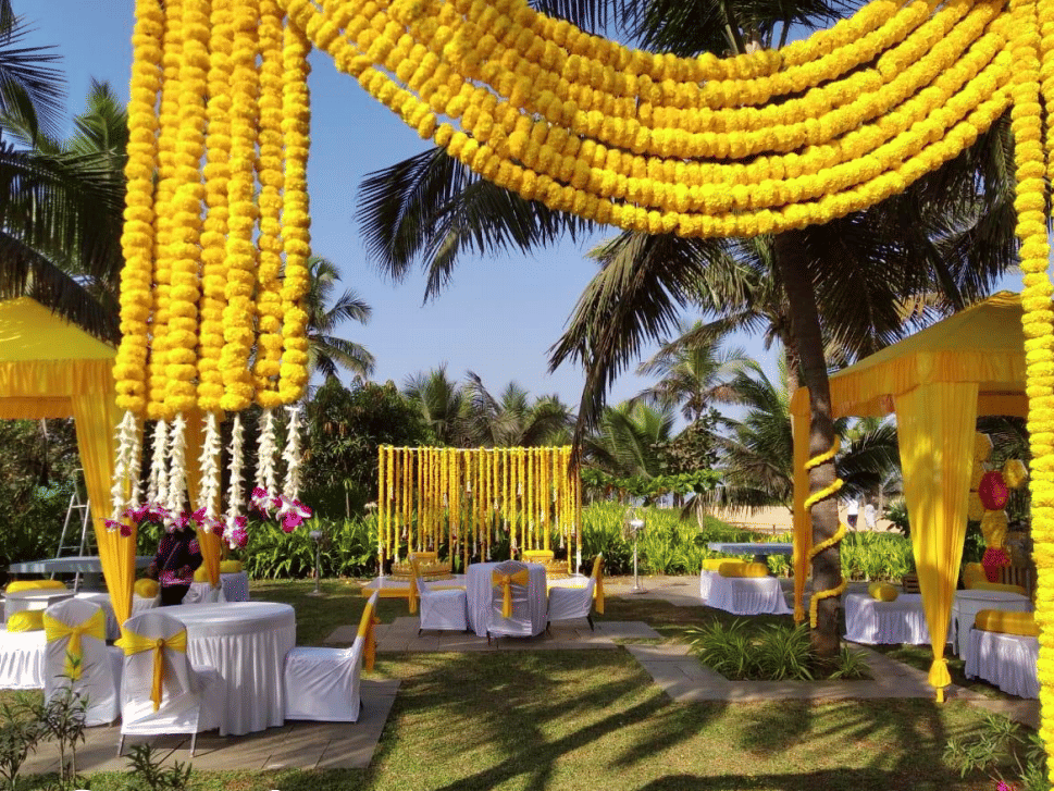 Vibrant floral decor for a ceremony at Azaya Beach Resort Goa, one of the top wedding resorts in Goa.