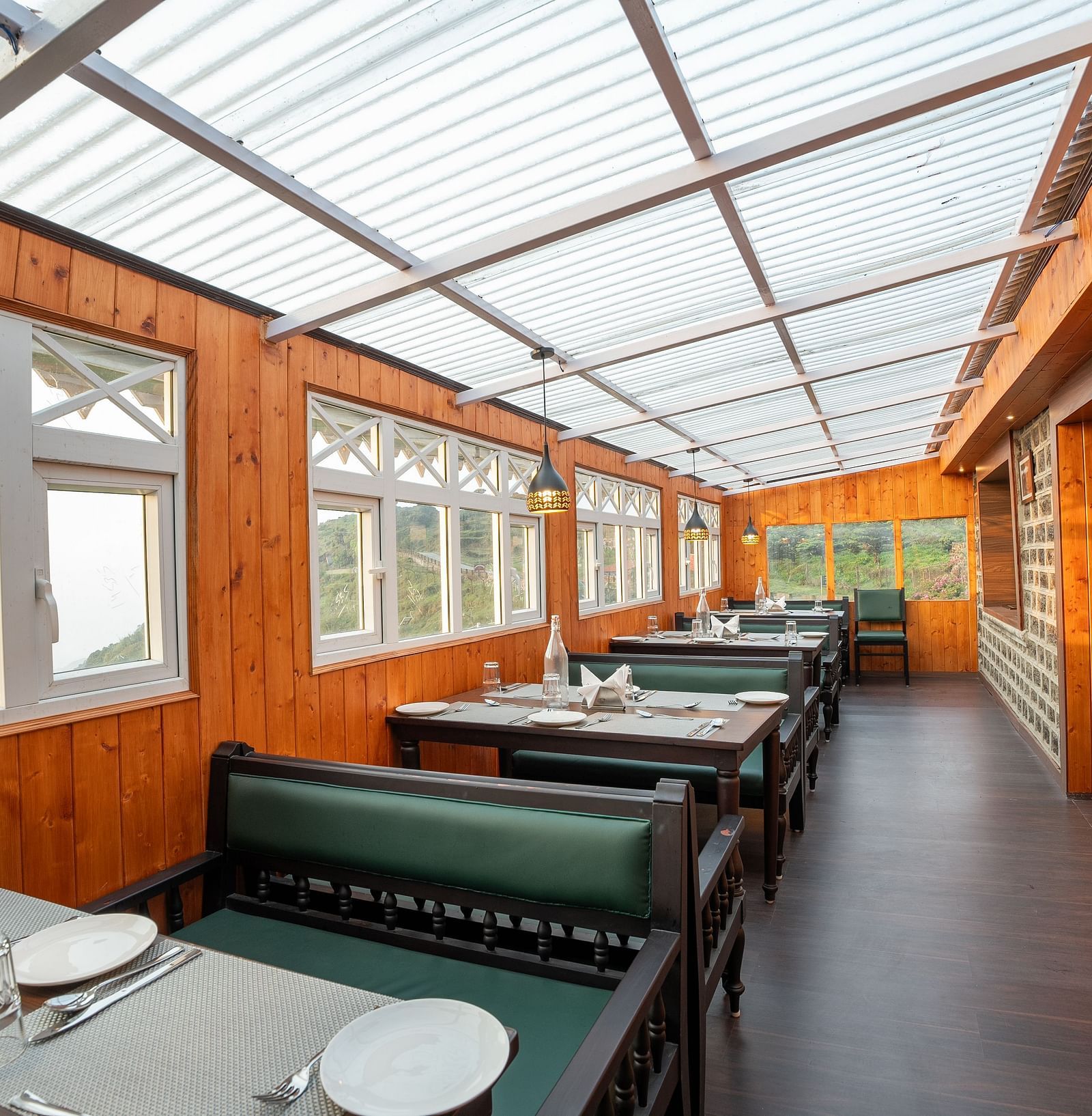 Seating arrangement in the restaurant at Poshtel, Meghma