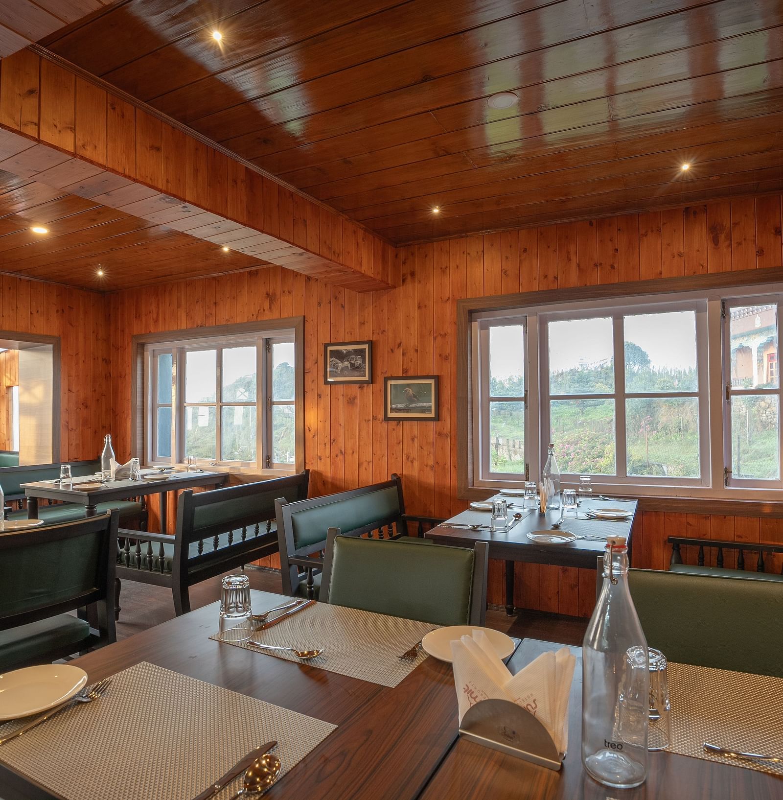 Seating arrangement in the restaurant at Poshtel, Meghma