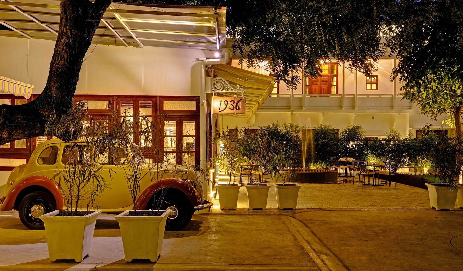 exterior of Saraca Lucknow with a white car placed in front of it