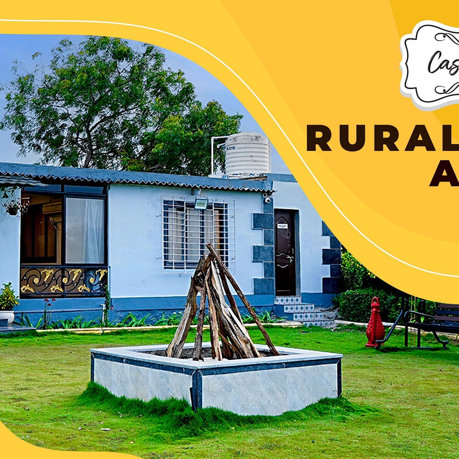 An image of a one storeyed building and a set up for bonfire at the lawn  | Diamond Parks, Pune