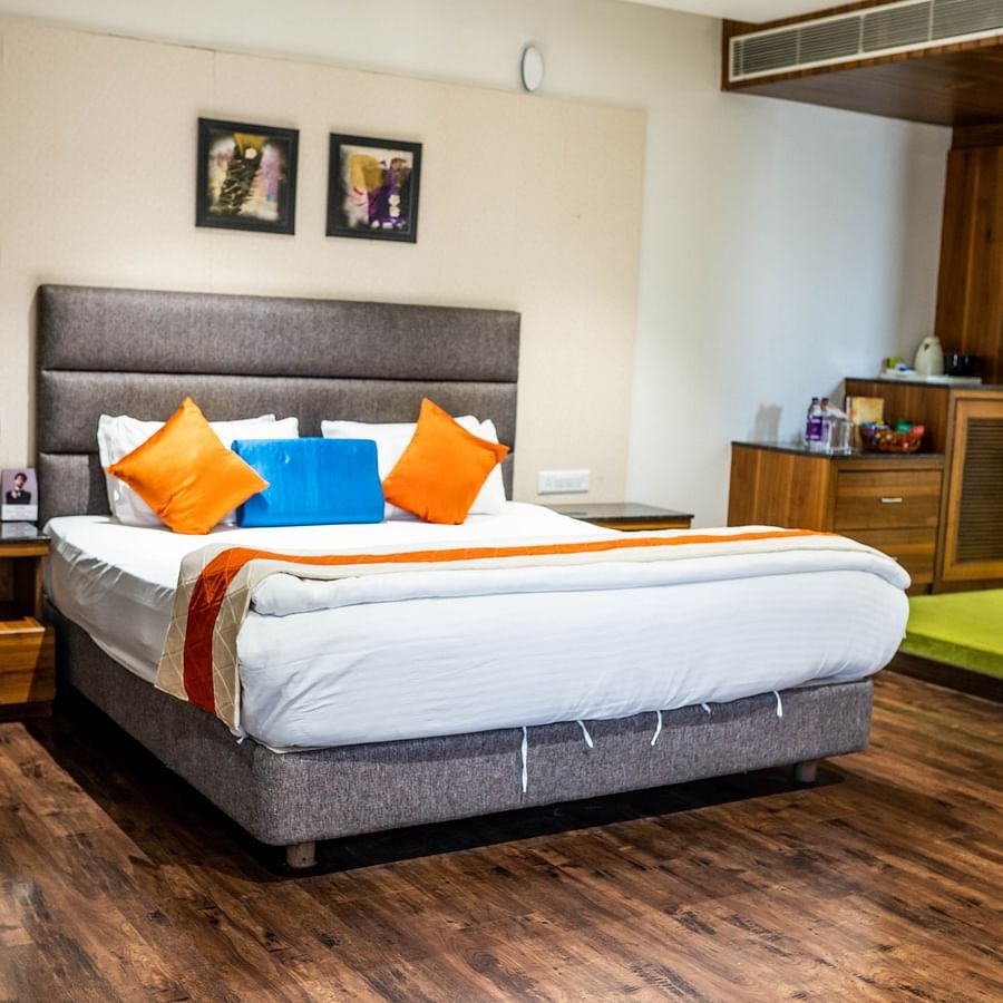The Premier With Breakfast room at Kyriad Hotel in Gulbarga featuring a king size bed.