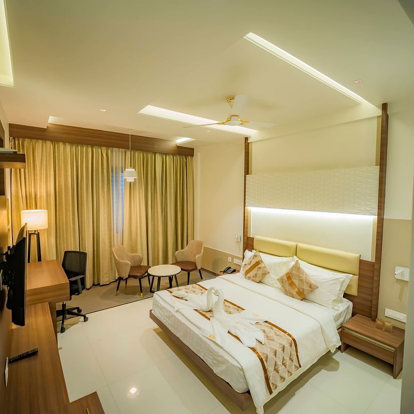 A full view of double Bed in the Executive Room With Breakfast at Kyriad Prestige, Ilkal