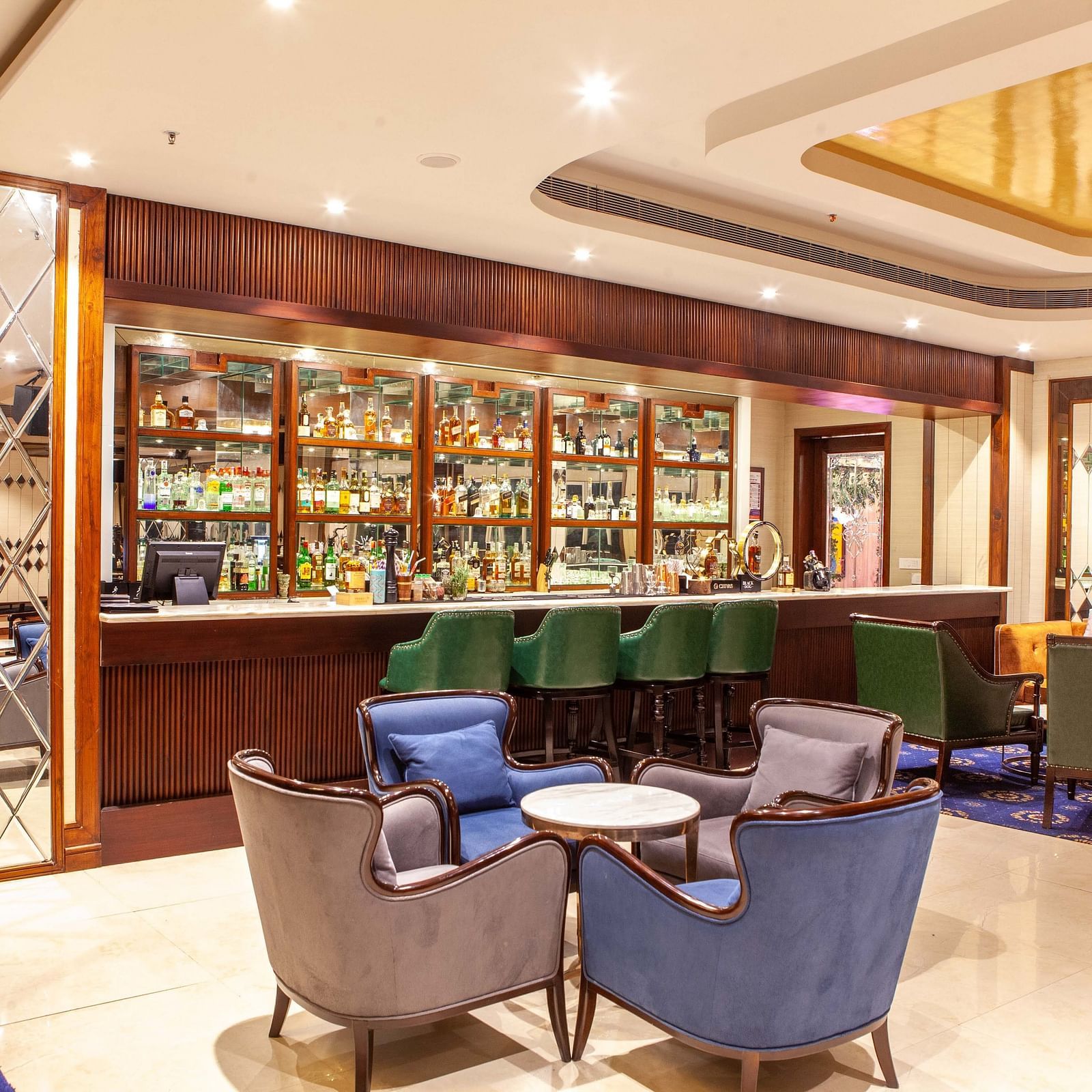 indoor seating space at the bar - Mayfair Lake Resort, Raipur 