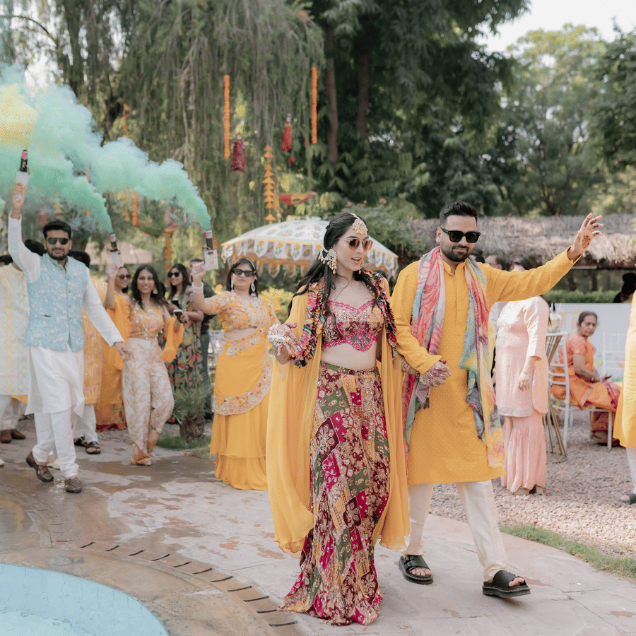 Lively haldi procession with guests dancing and celebrating at Umaid Palace
